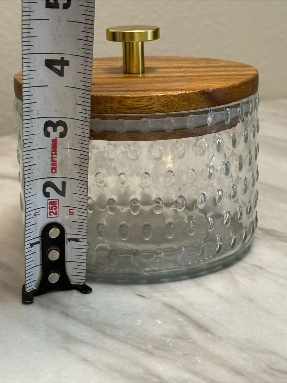 Round clear jar with wooden top gold finish handle